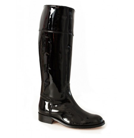 Black patent leather horse riding boots Black varnished leather .