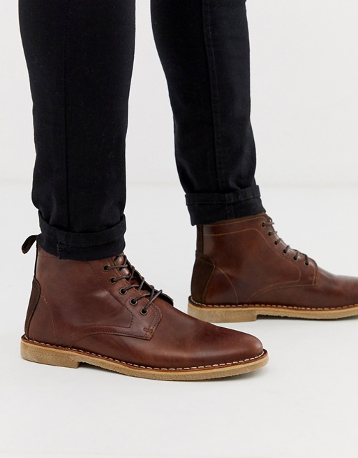 ASOS DESIGN desert chukka boots in tan leather with suede detail .