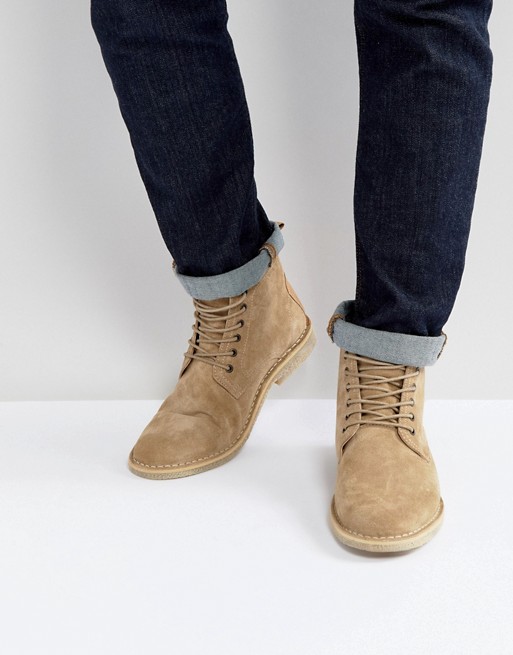 ASOS DESIGN desert chukka boots in stone suede with leather detail .