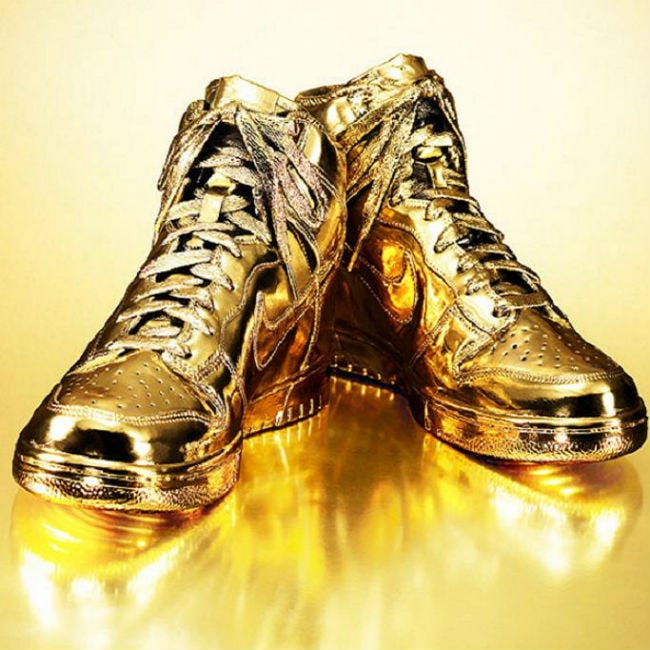 PHOTO: Nike Indulgences #5 Dipped In Real 24K Gold - Business Insid