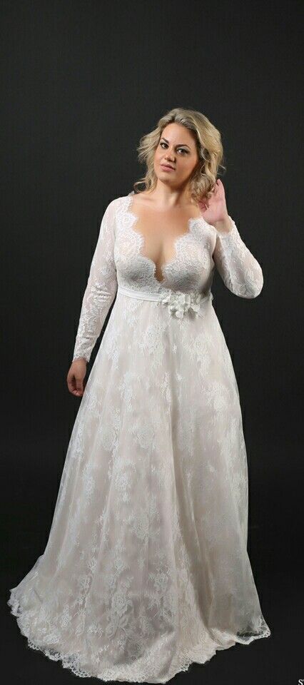 Plus size lace deep v-neck, long sleeves a-line wedding gown .