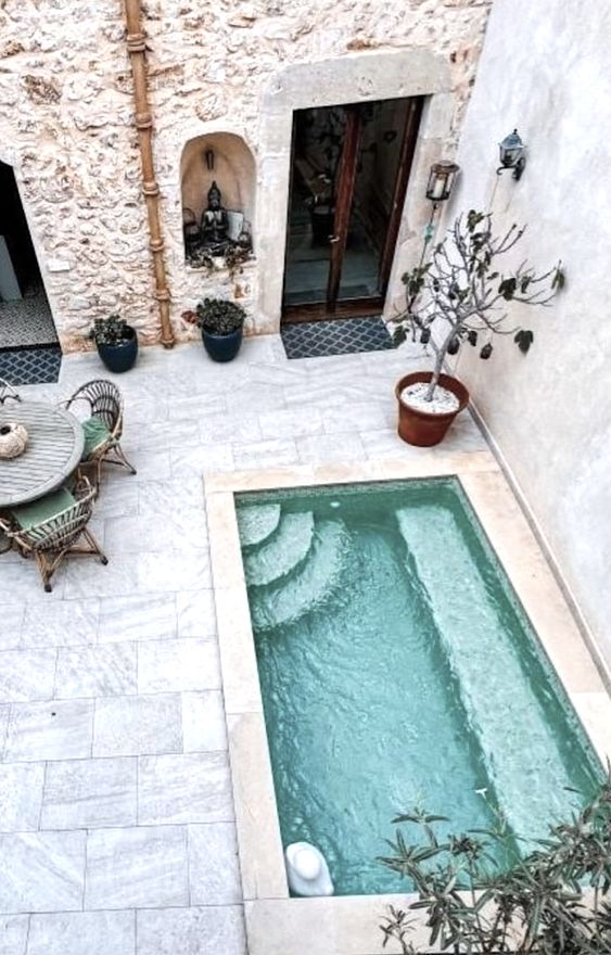 A Perfect Oasis: The Charm of a Petite Garden with Pool