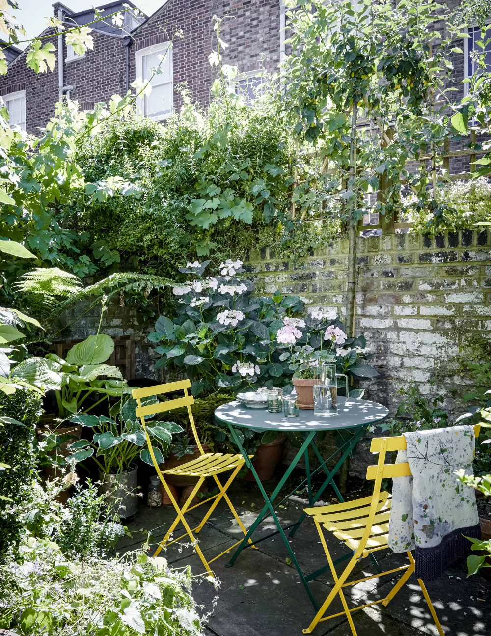 Creating a Cozy Outdoor Retreat: Transforming a Tiny Garden Space into a Charming Patio Haven