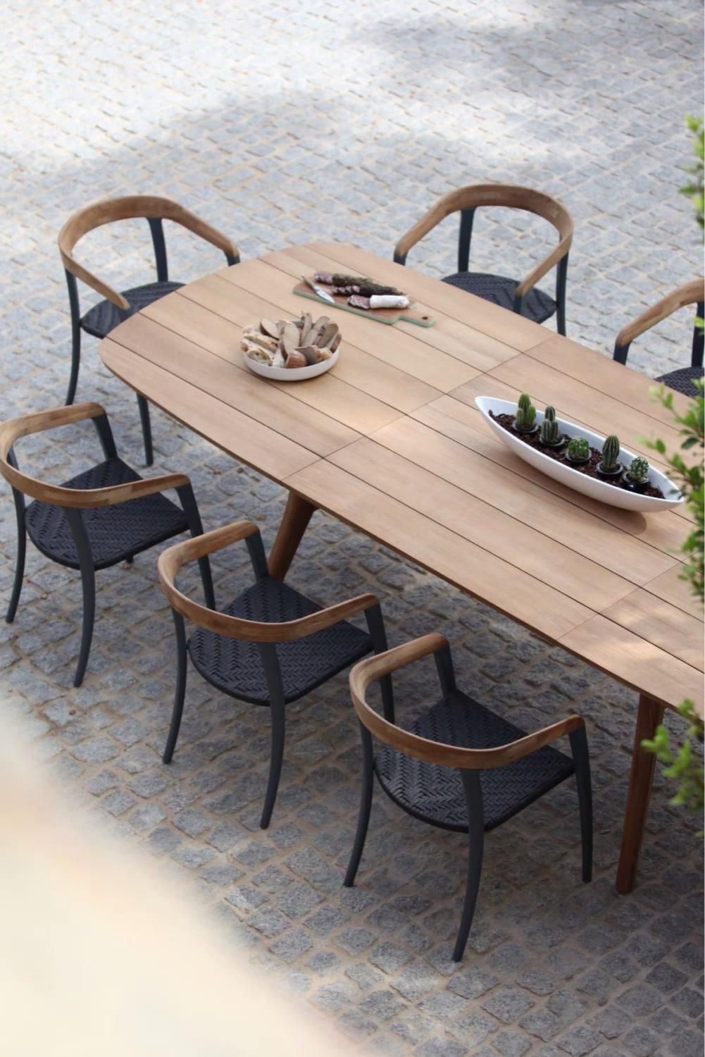 Dine alfresco with a stylish patio dining table