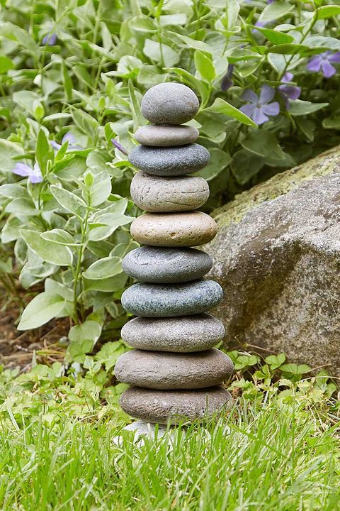 Enhance Your Outdoor Space with Charming Stone Garden Ornaments