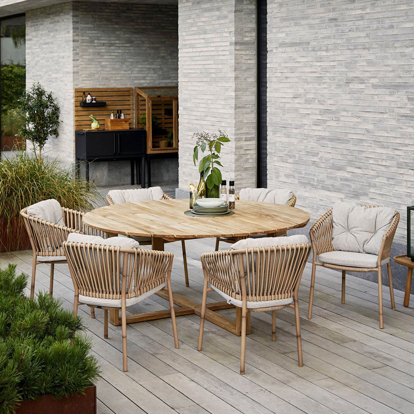 Enhancing Outdoor Spaces with Circular Dining Tables