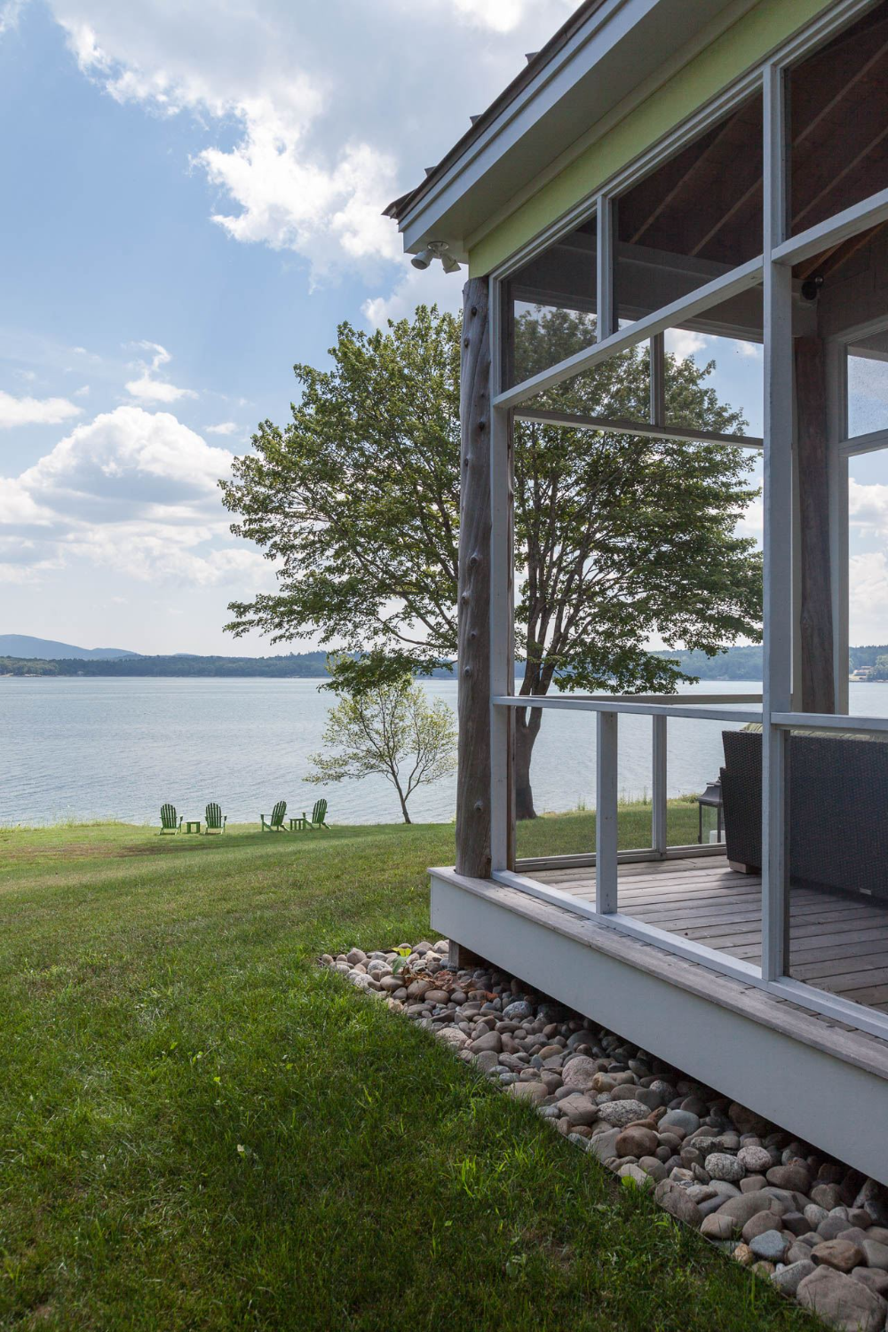 Enjoying the Outdoors: Screened-In Porch Adds Charm to Deck Living Space