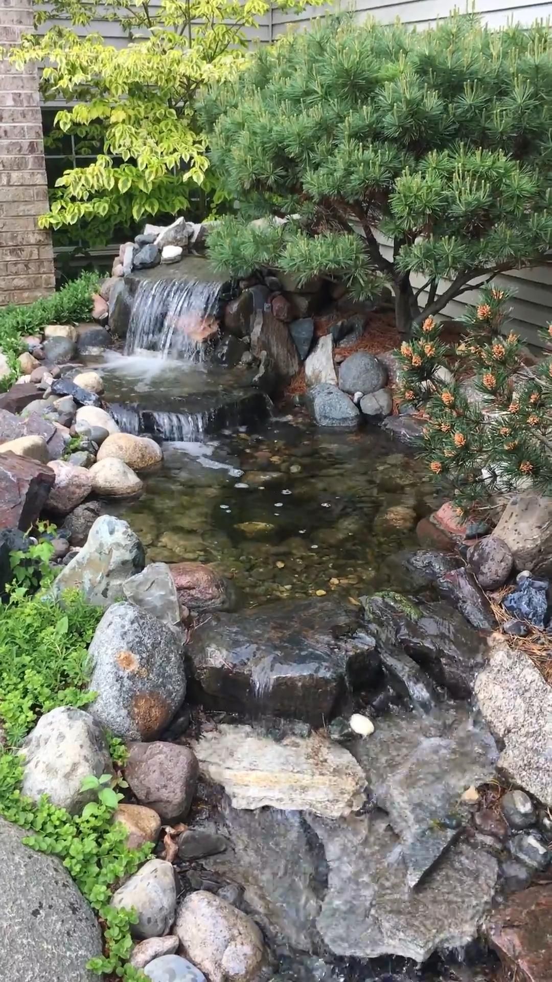 The Beauty of Garden Waterfalls: A Serene Oasis in Your Backyard