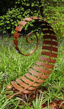 The Beauty of Metal Garden Art: Enhancing Outdoor Spaces with Handcrafted Pieces.
