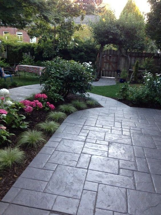 The Beauty of Stamped Concrete Patios: Enhancing Outdoor Spaces