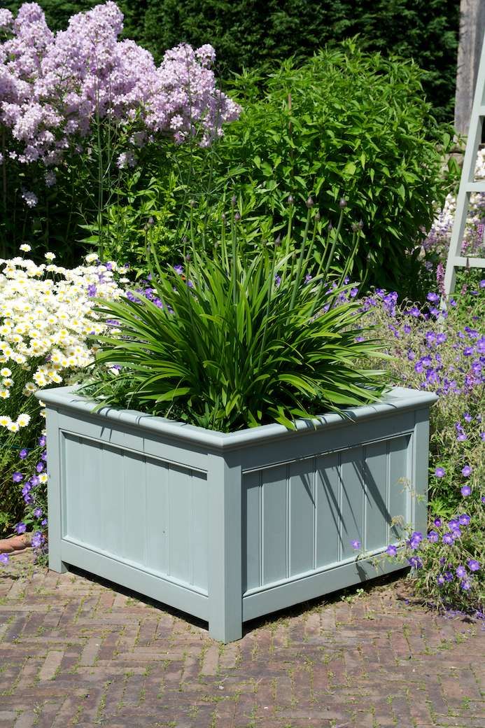 The Beauty of Wooden Garden Planters: Enhancing Your Outdoor Space