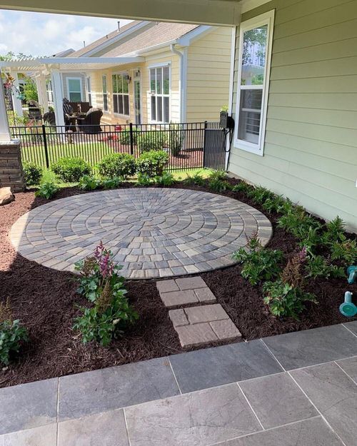 Transforming Your Front Yard into a Charming Outdoor Oasis with a Patio