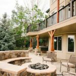 An expansive outdoor living space was designed with a TimberTech .