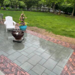 How does water exit your paver patio to prevent damag